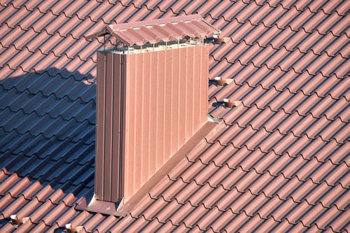 1st Rate Roofing LLC crew finishing a coated roof on the Mississippi Gulf Coast