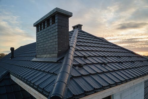 Reflective roof coating system installed on a Gulf Coast building by 1st Rate Roofing